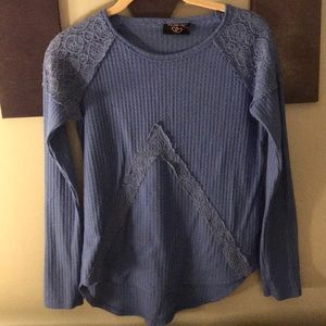 Blue long sleeve top with lace designs
